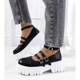 Chaussures noires sur une semelle de tracteur de Jonell 1