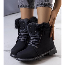 Bottes isolées noires avec fourrure de Rosmina le noir 1