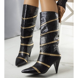 Bottes isolées Nevzo noires et dorées 1