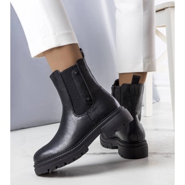 Bottes isolées noires de Caron le noir 1