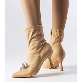 Bottines beiges ornées d'un nœud Mars en zircon 1