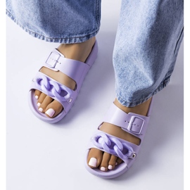 Chaussons en caoutchouc violet Étoile 1