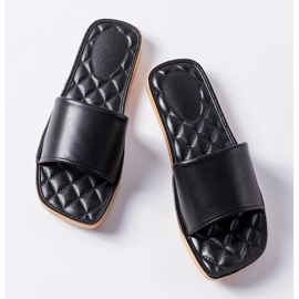 Claquettes en caoutchouc noir de Chatigny le noir 1