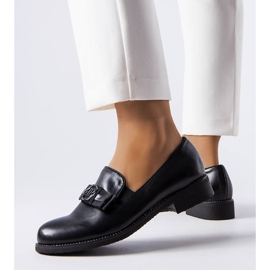 Mocassins noirs décorés d'un arc et de strass le noir 1