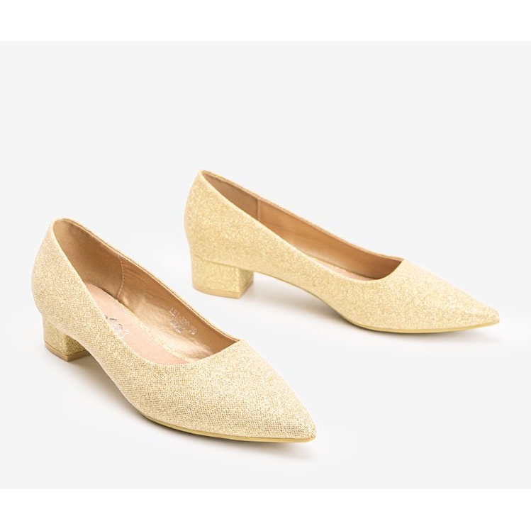 Pompes en or sur un poste bas Kennedy d'or 1