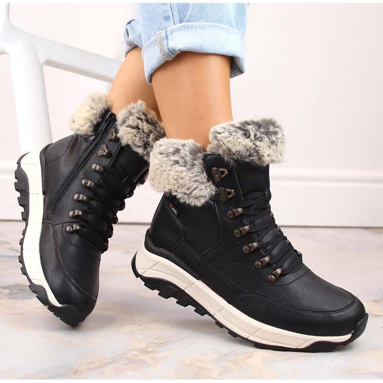 Bottines femme imperméables en cuir isolées avec de la laine, noires Rieker W0063-00 1