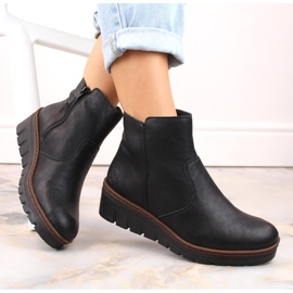 Bottines compensées noires confortables et isolées pour femme Rieker X9165-00 le noir 1