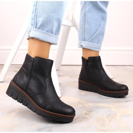 Bottines compensées noires confortables et isolées pour femme Rieker X9165-00 le noir 2