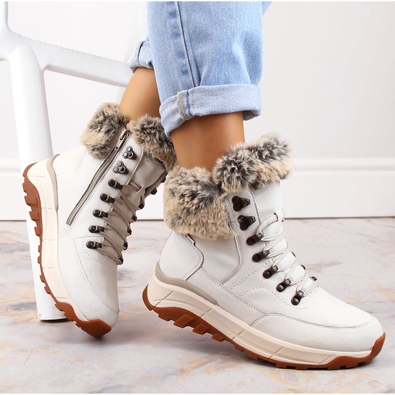 Bottines femme imperméables en cuir isolées avec de la laine, blanches Rieker W0063-80 1 Bottines femme imperméables en cuir isolées avec de la laine, blanches Rieker W0063-80 1