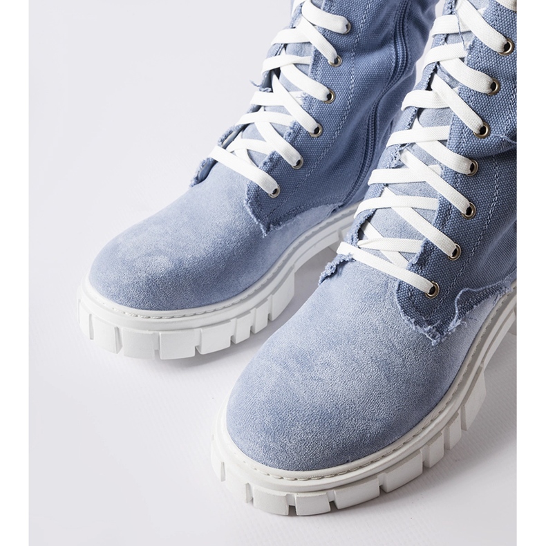 Bottes Palmer isolées en tissu bleu 1