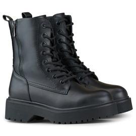 Bottes de travail plateforme femme noires à lacets 1