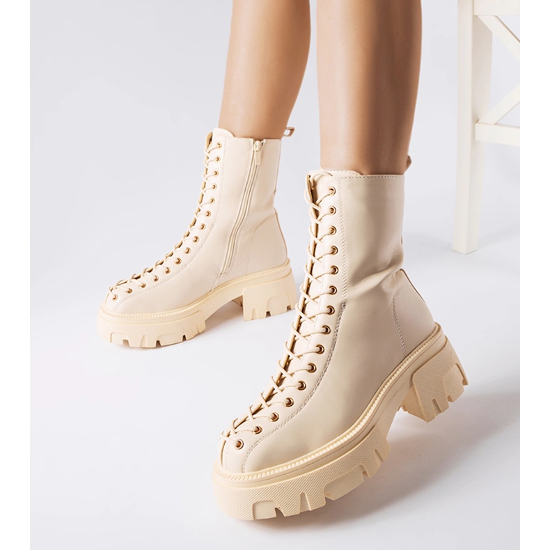 Bottines Bovver isolées beiges ornées d'un liseré Amla 1