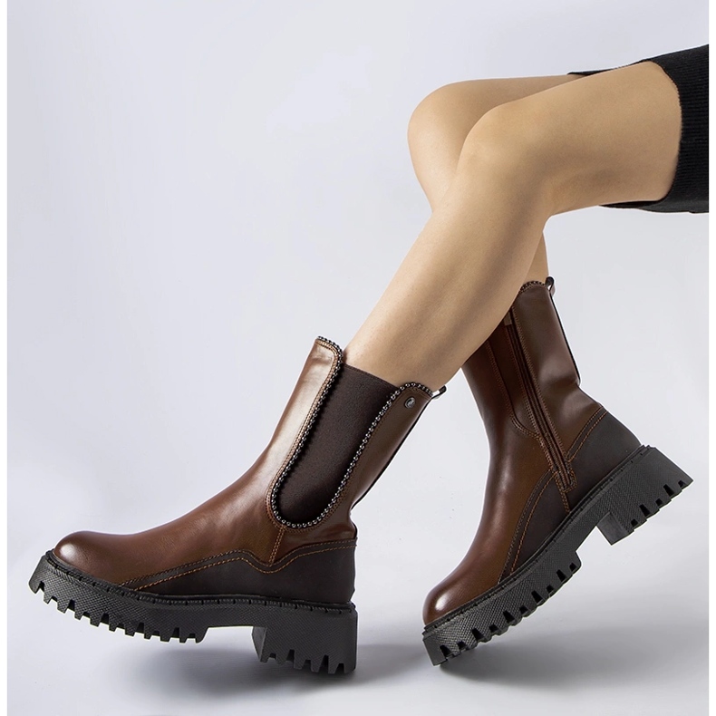 Bottes isolées marron par Donigala brun 1