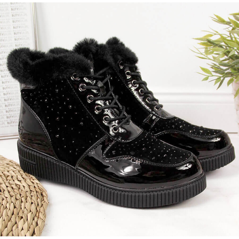 Bottes en cuir isolées en cuir noir Rieker 93312-00 sur la plate-forme 1