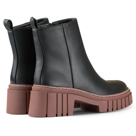 Bottines noires en éco-cuir à semelle plus haute 1