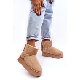 Bottes de neige pour femmes sur une plate-forme massive avec des beige frangés 3
