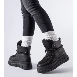 Bottines noires sur une plateforme massive Sforza le noir 1