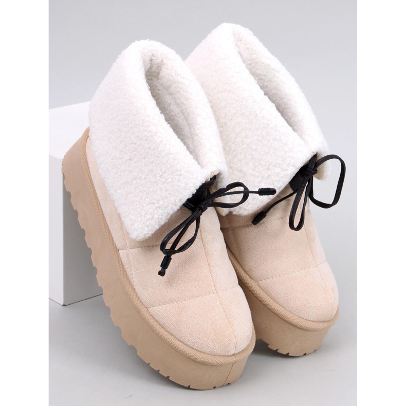Boots en peau de mouton beige 1