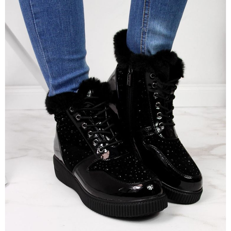 Bottes en cuir isolées sur la plateforme Rieker W 93312, noires 2