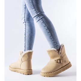 Bottes de neige isolées beiges à découpe de Monal 1
