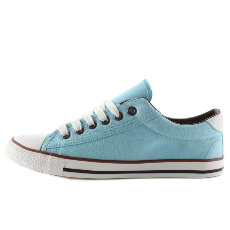 Baskets femme, face, finition bleue 1