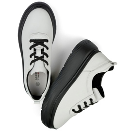 Baskets femme en cuir blanc à semelle noire blanche 1