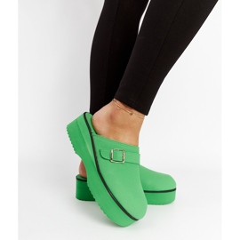 Le sabot vert glisse sur la plateforme Lang 3