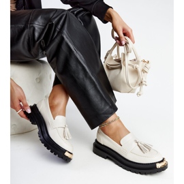 Mocassins massifs beige clair avec inserts dorés par Tuga 1 Mocassins massifs beige clair avec inserts dorés par Tuga 1