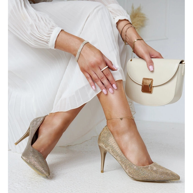 Talons hauts dorés brillants avec semelle intérieure en cuir 1