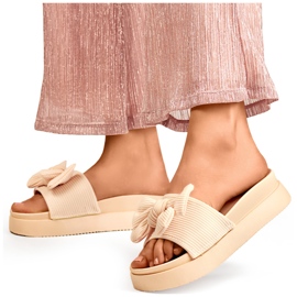 Chaussons femme beiges avec noeud sur semelle épaisse 1 Chaussons femme beiges avec noeud sur semelle épaisse 1