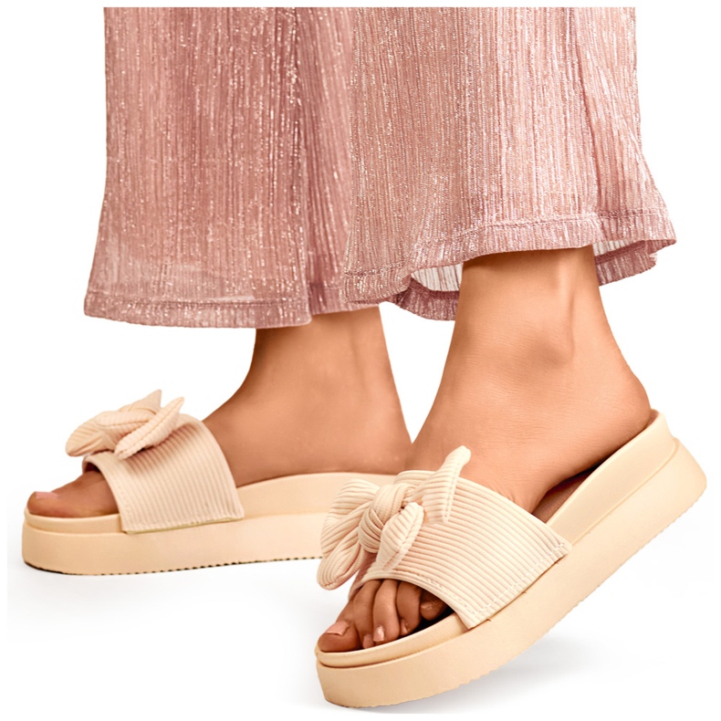 Chaussons femme beiges avec noeud sur semelle épaisse 1 Chaussons femme beiges avec noeud sur semelle épaisse 1