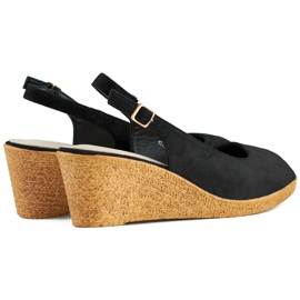 Sandales noires pour dames sur un coin bas le noir 1
