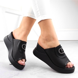 Chaussons compensés ajourés en cuir noir par Filippo DK6141 1