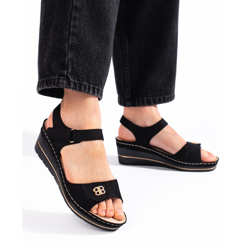 Sandales compensées en daim noir le noir 1