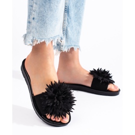Tongs femme noires avec une fleur le noir 1
