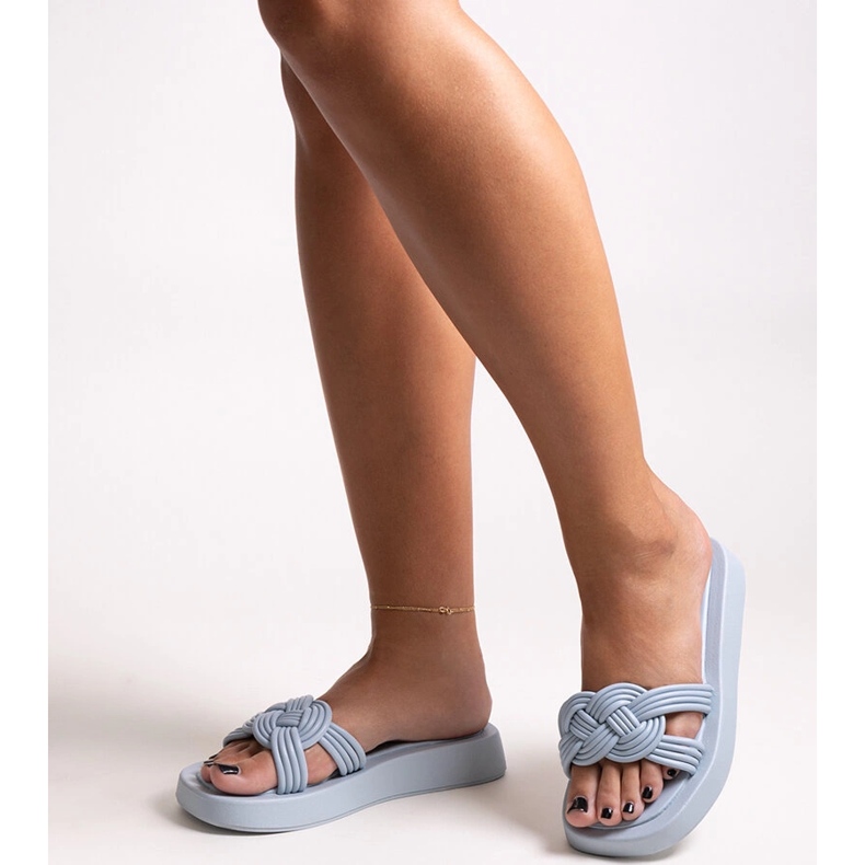 Chaussons en caoutchouc bleu de Ferrei 1