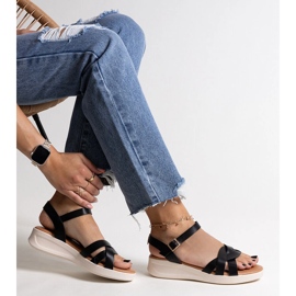 Sandales compensées basses noires de Khalid le noir 1