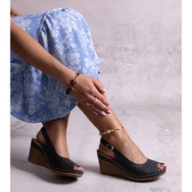 Sandales compensées Sakna noires 1