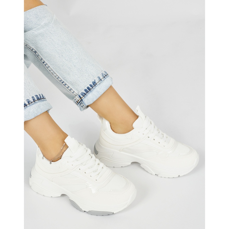 Chaussures de sport blanches à semelle épaisse 1