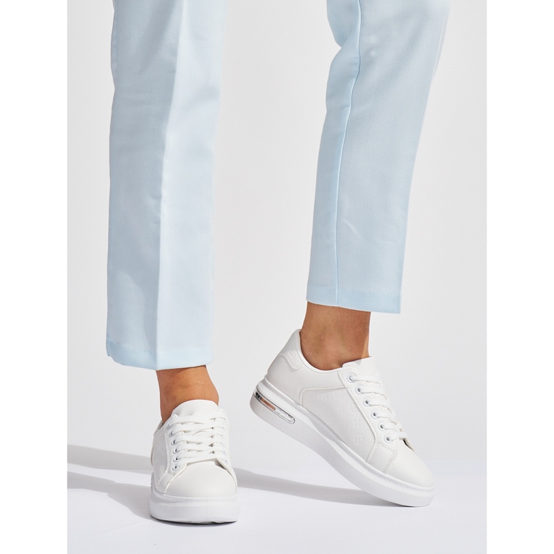 Chaussures de sport à plateforme blanches 1