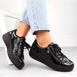 Chaussures compensées femme en cuir verni noir Rieker N2501-00 le noir 2