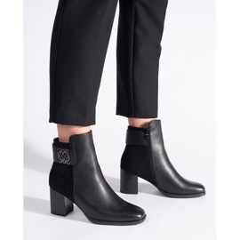 Bottines noires à talons hauts et bride décorative le noir 2