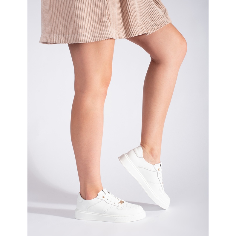 Chaussures de sport en cuir blanches pour femmes 1 Chaussures de sport en cuir blanches pour femmes 1