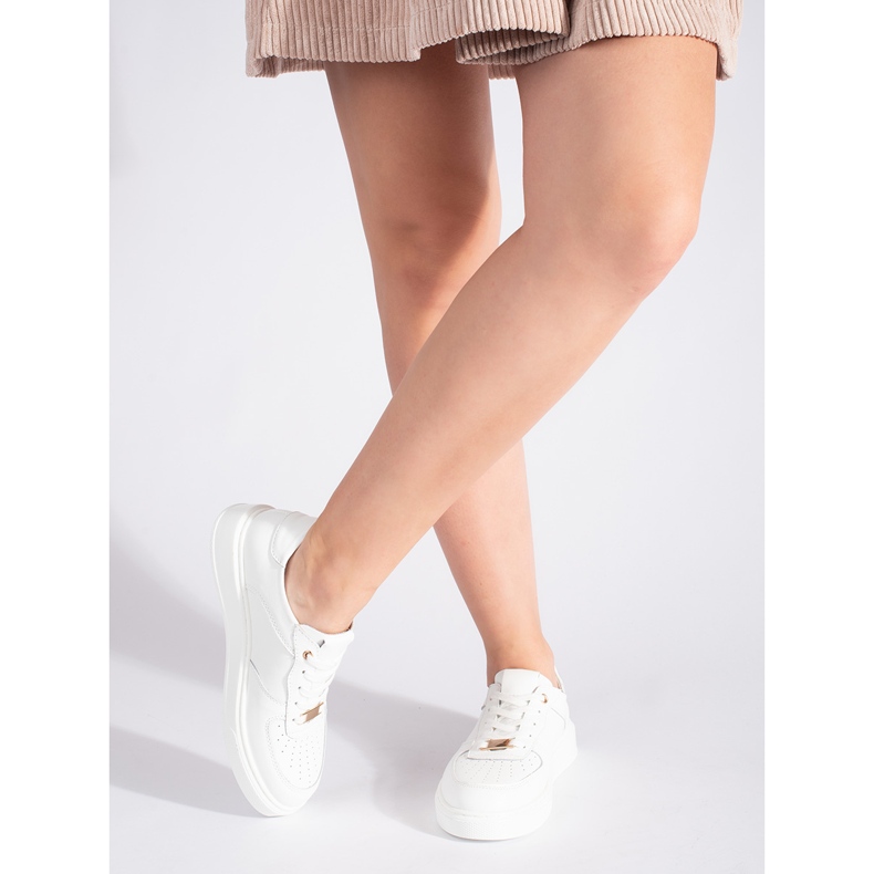 Chaussures de sport en cuir blanches pour femmes 2 Chaussures de sport en cuir blanches pour femmes 2