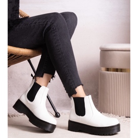 Bottines à plateforme blanches par Lessaya 3