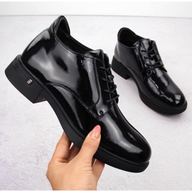 Bottines femme en cuir verni noir Vinceza 58413 le noir 1 Bottines femme en cuir verni noir Vinceza 58413 le noir 1