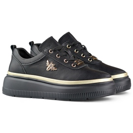 Baskets femme en cuir noir avec accessoires dorés le noir 1