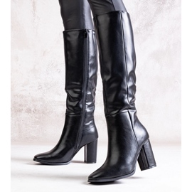 Bottines noires à talons hauts en éco-cuir Toume le noir 1