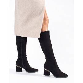 Bottines femme en daim noir sur le poteau 1