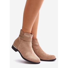 Bottes femme isolées beiges sur talon plat avec détail doré Ravasira 1